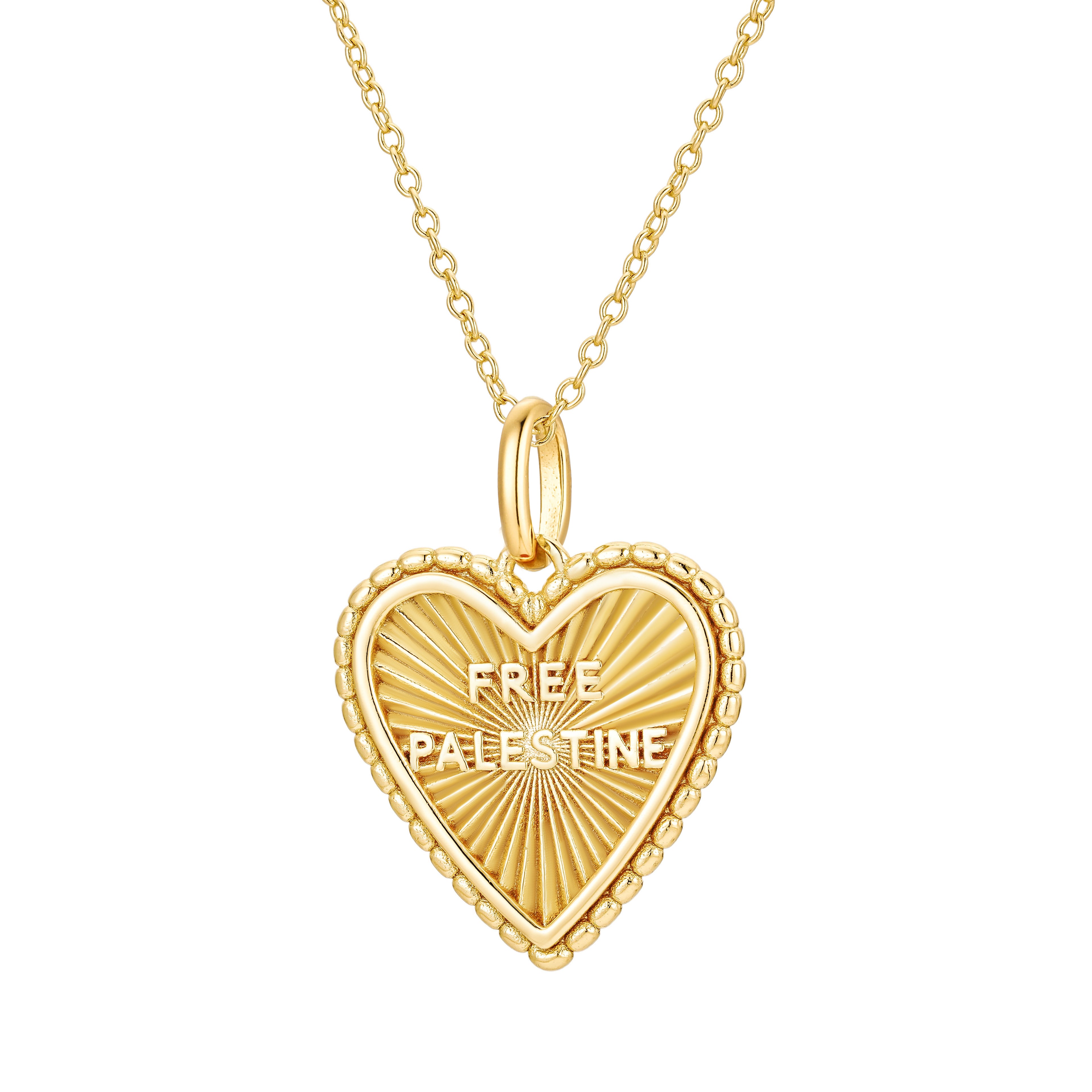 Image shows a gold pendant necklace. The pendant is a heart shape with the text 'Free Palestine'.