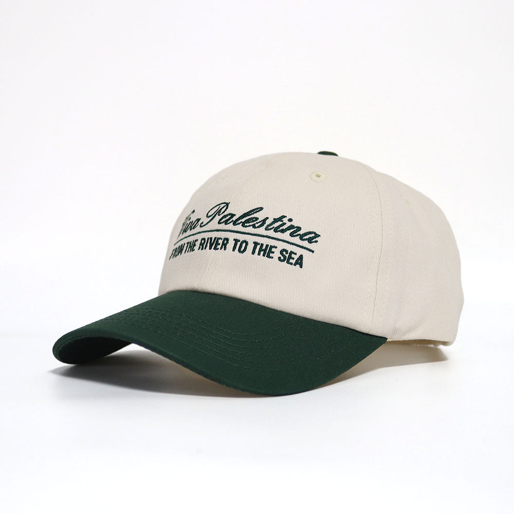 Off-white and green dad hat with with the text 'Viva Palestina, From the river to the sea' embroidered in Green.